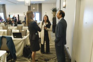 Ashe Puri (Fox Rothschild) talks with Erin Mehta of Hulu, and Ellen Lin of KaVo Kerr Group, after a session at Washington in the West 2019.