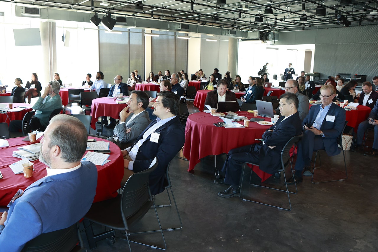 TechTainment 8.0 at LMU School of Film and Television. Attendees watch during a panel.